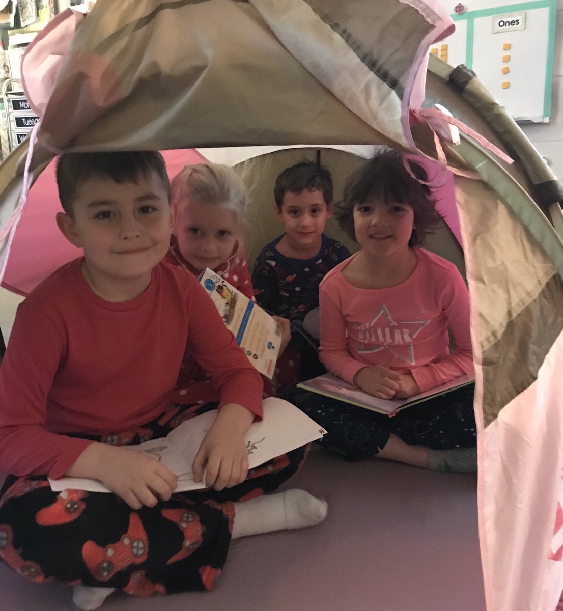 ashleydmurphy1's tweet photo. No better way to get caught reading than wearing your pajamas, with some friends, in a tent, or while eating popcorn and pizza!! #GetCherokeeReading #CCSDkidsread #CCSDreads #GetCCSDreading #haveyoureadtoday @ClarkCreekSTEM https://t.co/br25cL9qjT