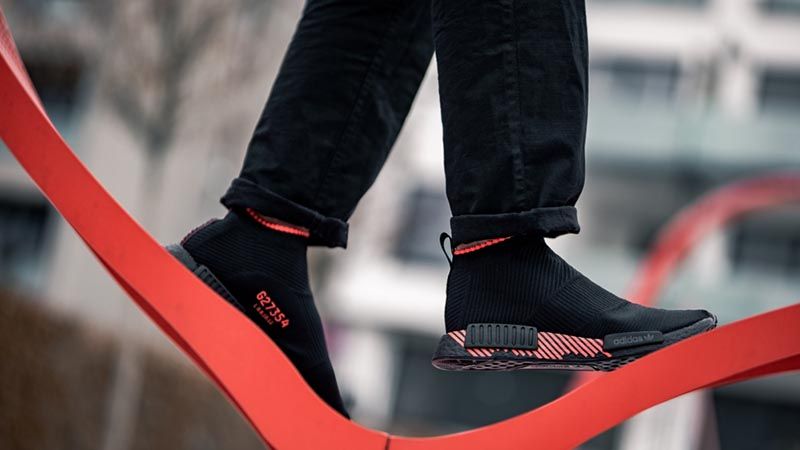 nmd cs1 black red