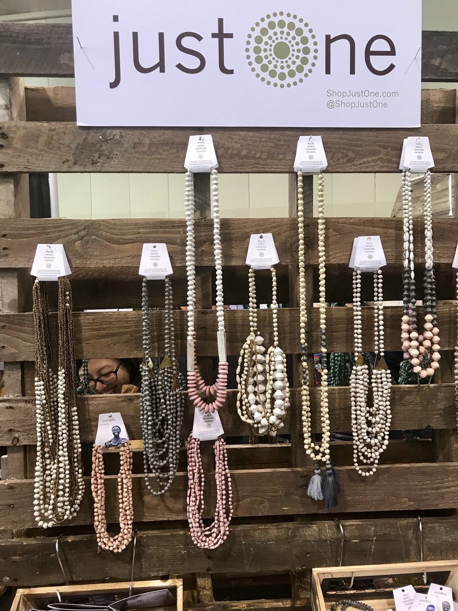 Incredible recycled paper jewelry made by former child soldiers, women who are HIV positive, and people living in poverty. <a href="/shopjust1/">Just One</a> #GLS19