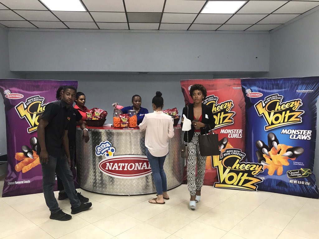 IndiggoConJA's tweet photo. When @nationalbakery said BIG ON FLAVOUR, they weren't kidding‼️Be sure to grab some Cheezy Voltz and snack up through the conference 😋 #IndiggoJA #TheExposureCall https://t.co/QzwnZV5KNi