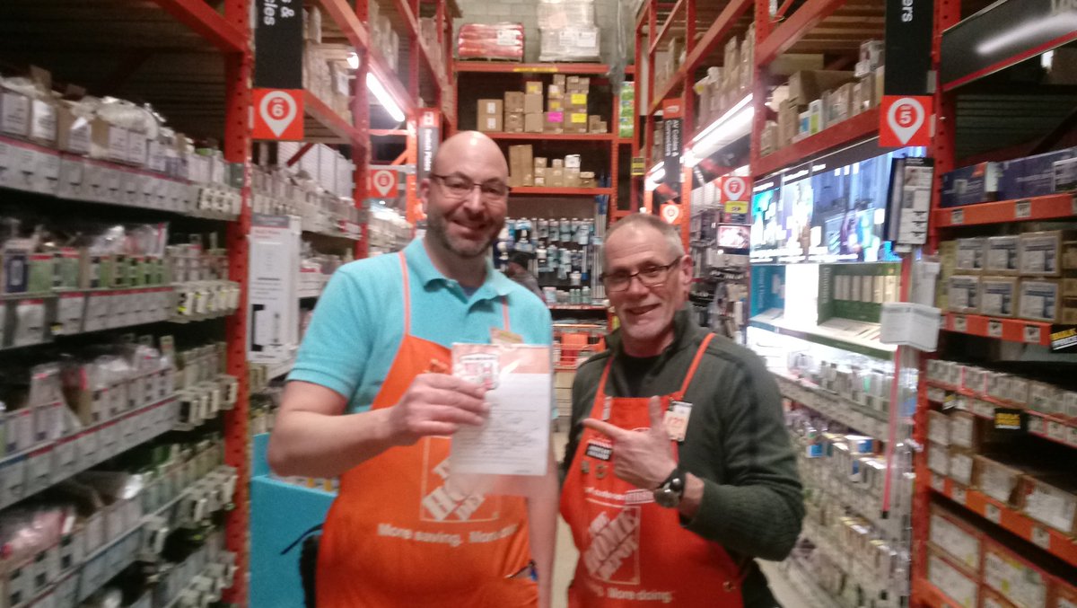 Great Job Ron!! Building tree and wheel barrel corral for garden.