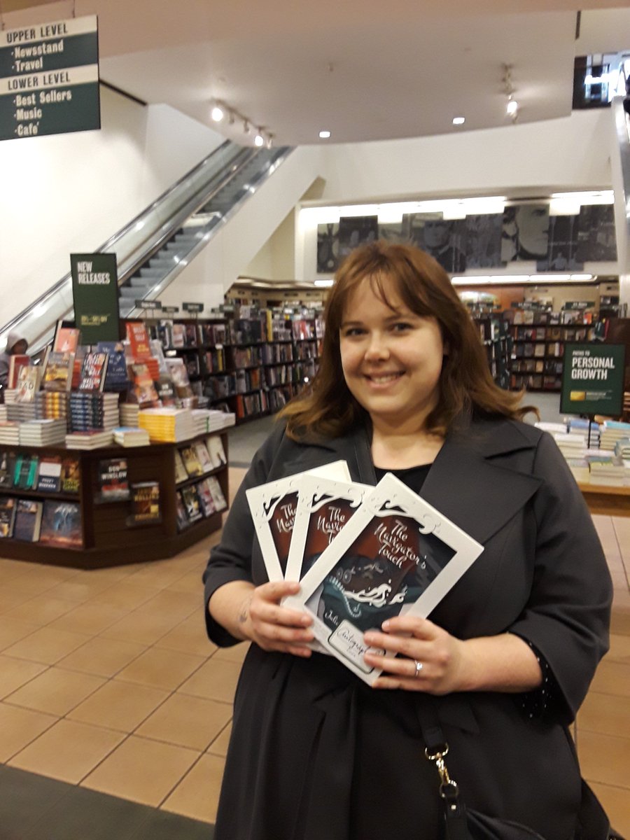 BNSeattle's tweet photo. Local YA author Julia Ember stopped in today to sign copies of her fantasy adventure book The Navigator's Touch. Stop in and grab a copy on our Signed Book display before they are gone! @jules_chronicle #Memberssaveeveryday #signedbook https://t.co/RwpgHoQTQE