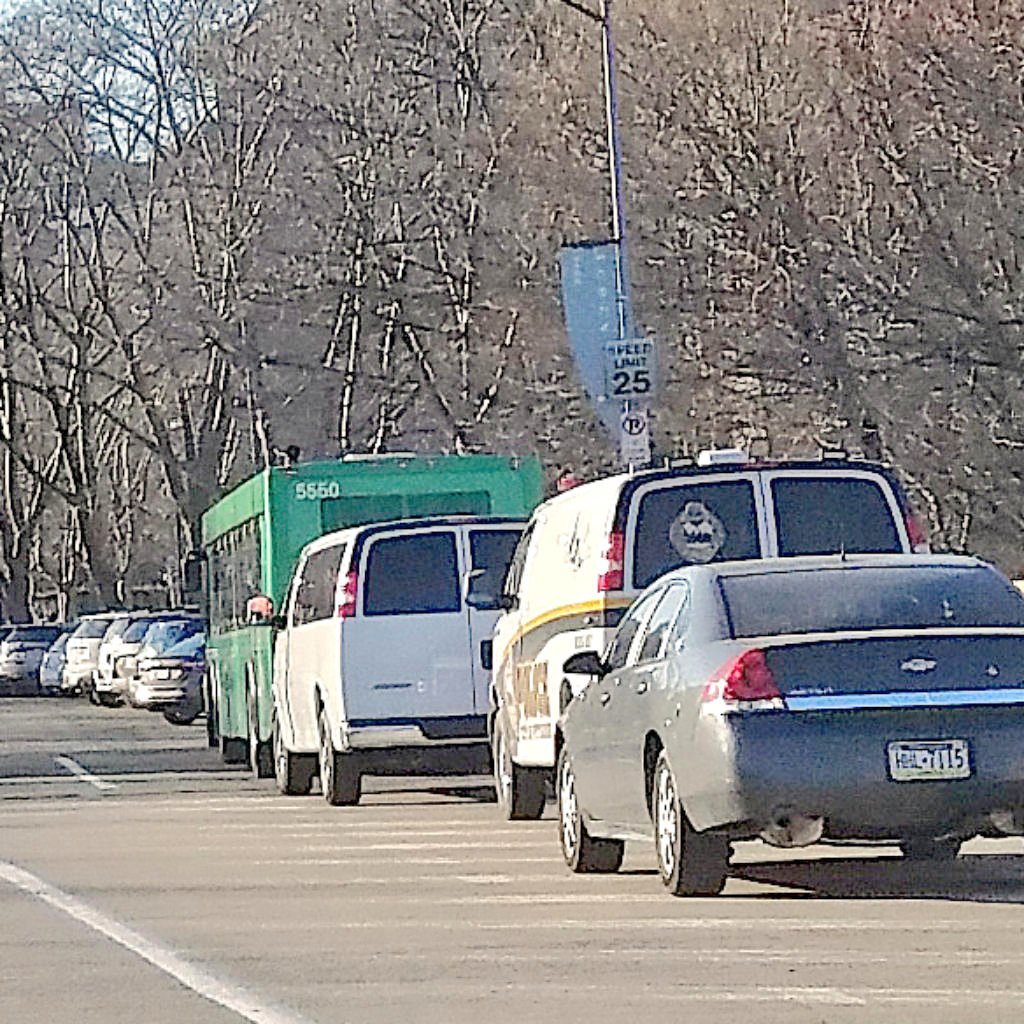 Protest in Oakland. Along the side of the road next to the library, there is an entourage with an ENTIRE PAT BUS FULL of police, tucked far enough away where no one (protestors, media) can see them in case protests don't go down the way they want them to. #AntwonRose #pittsburgh