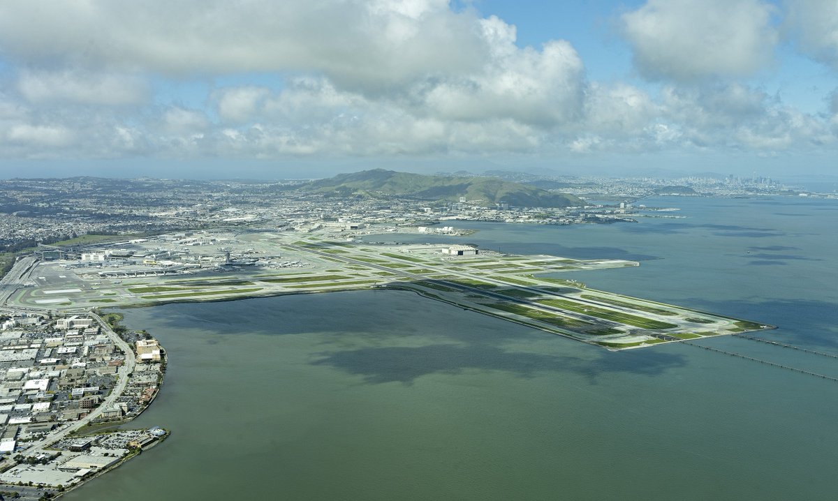 Looking out over <a href="/flySFO/">San Francisco International Airport (SFO) ✈️</a> this afternoon, from 1,800 ft. a bit Southeast. #SanFrancisco in the background, right.  @aerialmapping #aerialphotography . <a href="/flySFO/">San Francisco International Airport (SFO) ✈️</a>, thanks for your help and letting us into your airspace!