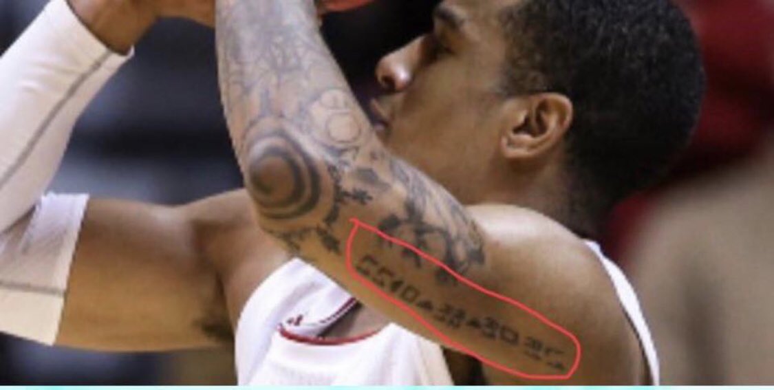 hoopfiends's tweet photo. Indiana Guard Devonte Green has the Grand Theft Auto code for “Unlimited Ammo” tatted on his shooting arm. This the realest shit I’ve ever seen. #GreenLight https://t.co/fVsFtGoznM