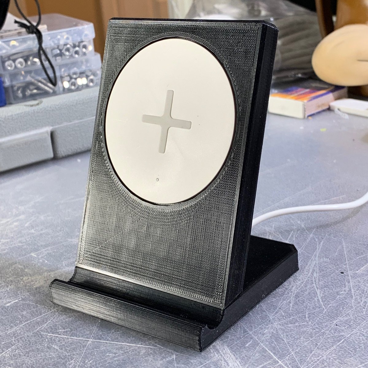 Daverig's tweet photo. New print design. Integrated a IKEA wireless charger into a phone stand. Find it on @myminifactory https://t.co/9U3tAPfSgj #3dprinting #wirelesscharging #inductioncharging #phonecharger #ikea #wirelessphonecharger #iphonecharger #myminifactory https://t.co/tJxvumWdnN