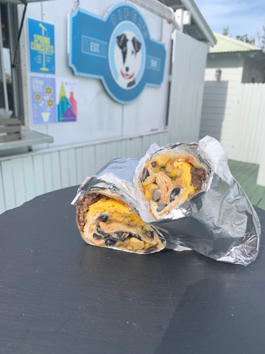 Pipers_Kitchen's tweet photo. Sunday funday breakfast burrito loaded with fried egg, cheddar cheese, sausage, corn &amp; black bean salsa, and chipotle sour cream. #dinealysbeach #piperskitchen https://t.co/noF49xHeYX