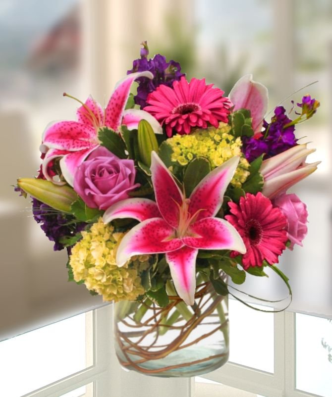 CarithersFlwrs's tweet photo. Garden favorites like stargazer lilies, gerbera daisies, fragrant purple stock, and garden roses artfully designed in a ginger glass vase. A beautiful gift for any occasion. #carithersflowers #familyowned #atlantaflorist #springflowers #thankyouflowers https://t.co/pqA7wV94yT https://t.co/sxnq2InVJd