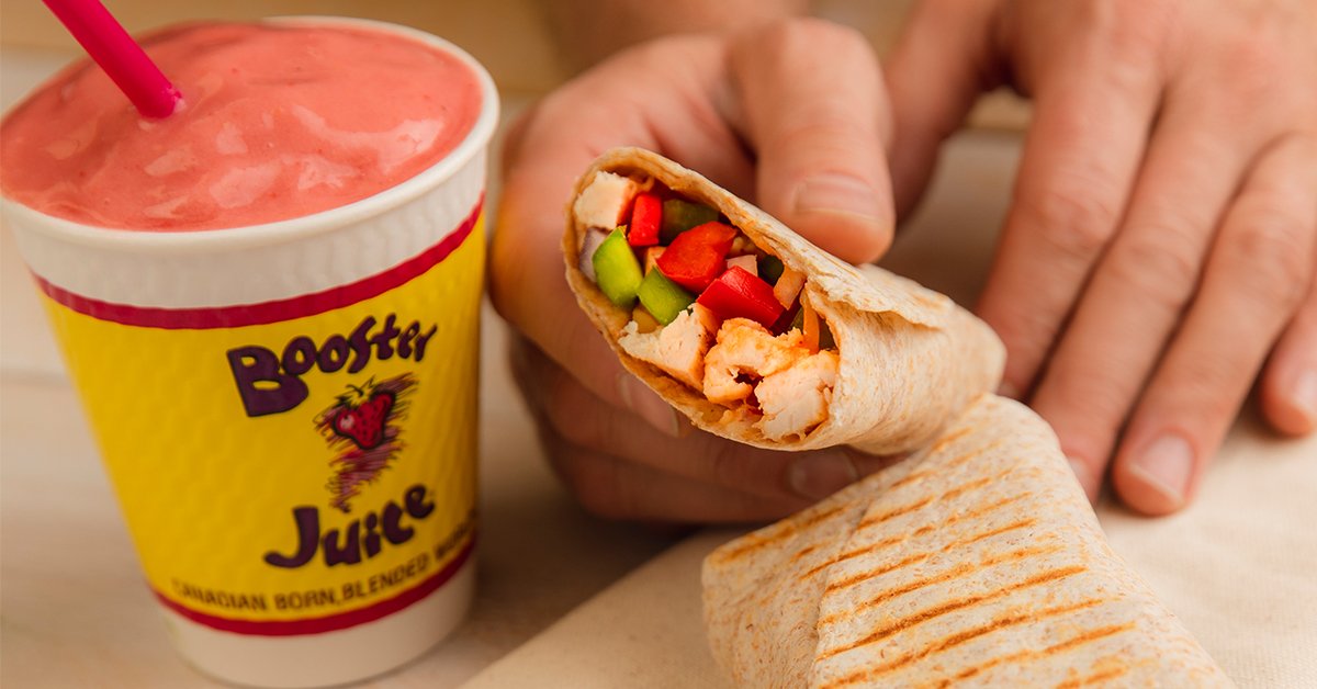 boosterjuice's tweet photo. Feeling snacky? How do grilled chicken strips, Monterey jack cheese, mixed peppers and red onions, and chipotle sauce, served in a grilled whole wheat tortilla shell sound? ❤️   #ChipotleChickenWrap #BoosterJuice https://t.co/S2jwm4HTzt