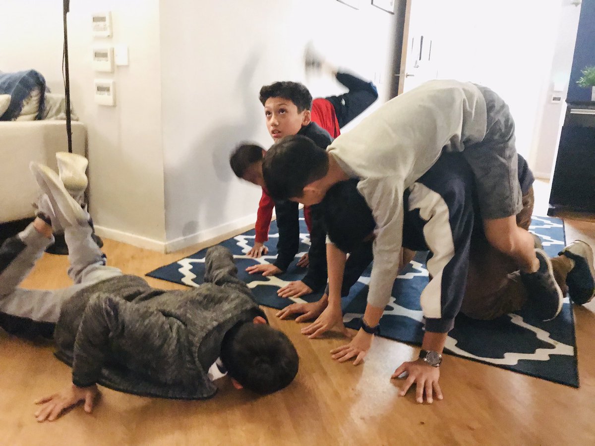 HHKSShackleton's tweet photo. The boarding week started with a bang this evening with a #boysofshackleton team building challenge! Well done to team Wild for taking the points in the Magic Carpet and Hands & Feet! @Harrow_HK @HeadHarrowHK #boysofcourage https://t.co/bxC2bQ4niV