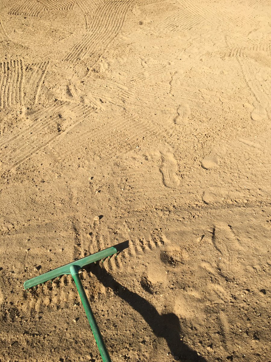 KnellDennis's tweet photo. The green thing is a rake, the yellow stuff is sand...for the avoidance of doubt the green thing is used to smooth footprints in the yellow stuff...😡 https://t.co/d1UXdhsW2y
