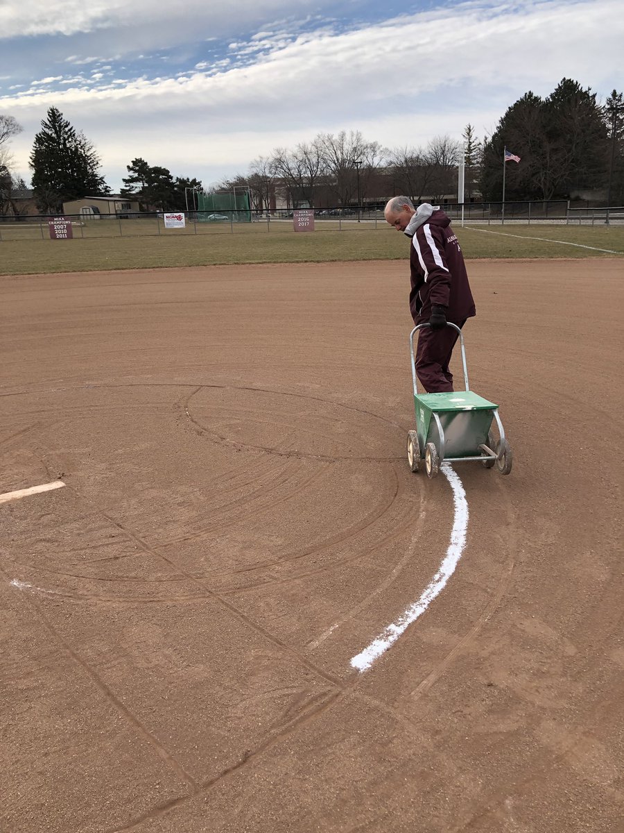 AlmaScotsSB's tweet photo. What does Coach Griffin do after passing his 900 win milestone? Gets up early to line the field for todayβs DH. #GoScots #KAAC #Plaidworks #ACSoftball #Culture #GreatScotsAtWork https://t.co/ZifWThiyY8