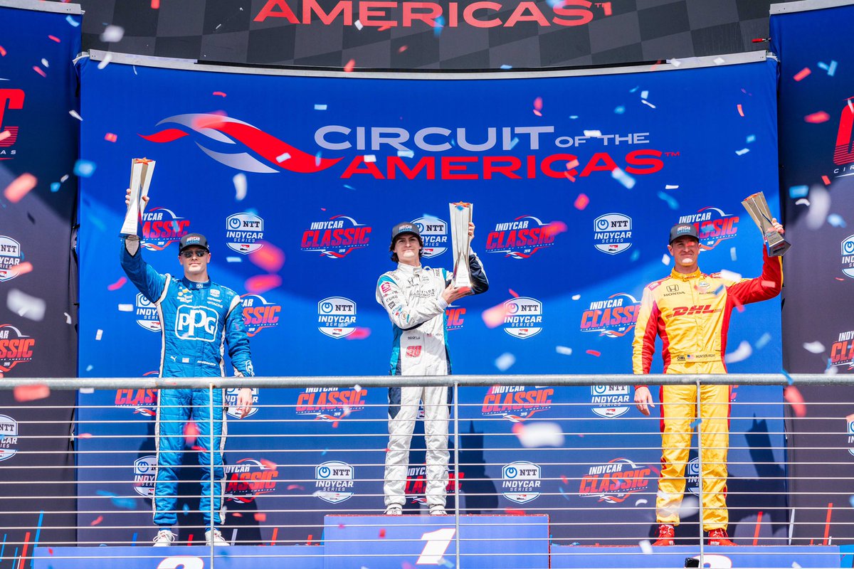 TCFpodcast's tweet photo. [MAR 24] Colton Herta becomes the youngest-ever IndyCar winner at the series’ first visit to COTA. Josef Newgarden came in second with Ryan Hunter-Reay close behind in third. Will Power was set to win with his initial pole, but suffered gearbox issues. #INDYCARClassic https://t.co/BakCWvK5D3