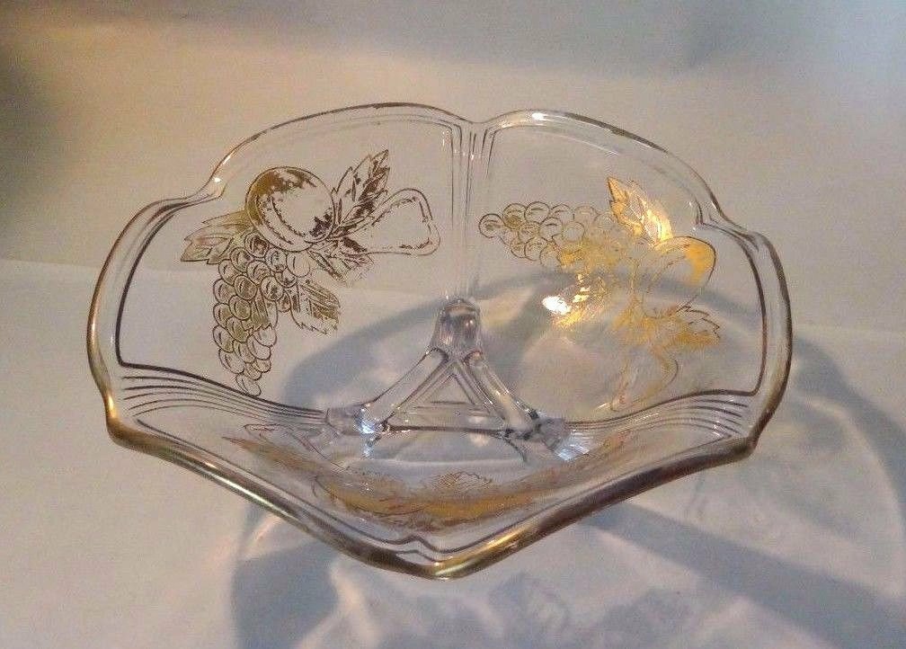 Excited to share the latest addition to my #etsy shop: Gold design Glass Fruit dish, Grape design, from the 1950s #housewares #gold #clear #housewarming #christmas #footedcandydish #vintagecandydish #candydish etsy.me/2uqlk7x