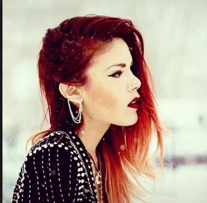 Standing out on the balcony of her hotel room, the crimson haired irish female closed her eyes and inhaled the cool, crisp, snow ridden air. 

"...Ahh~"