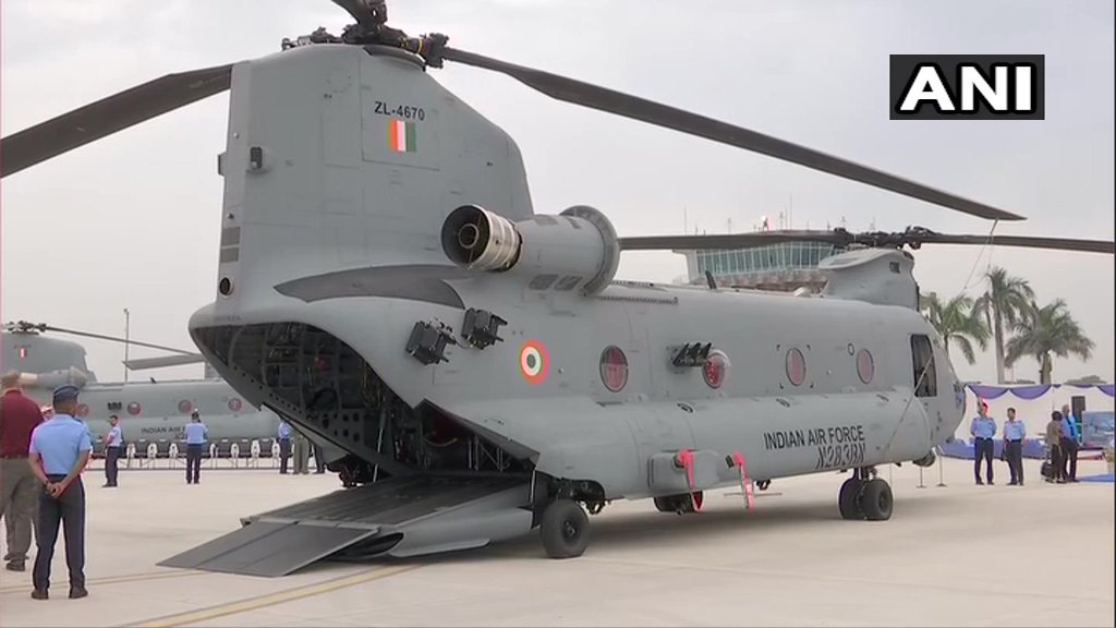 ANI's tweet photo. Visuals of Chinook heavy-lift helicopter at Air Force Station 12 Wing, in Chandigarh. Indian Air Force to induct the first unit of four Chinook helicopters today. https://t.co/folqFBr411