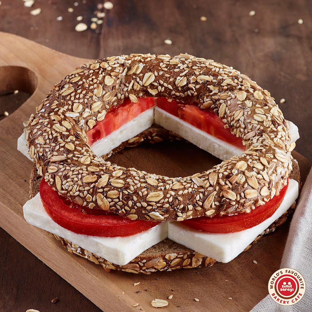 SimitSarayi_UK's tweet photo. Seeded simit for lunch – for some sunflower seed goodness! https://t.co/NvAzOFv3oc