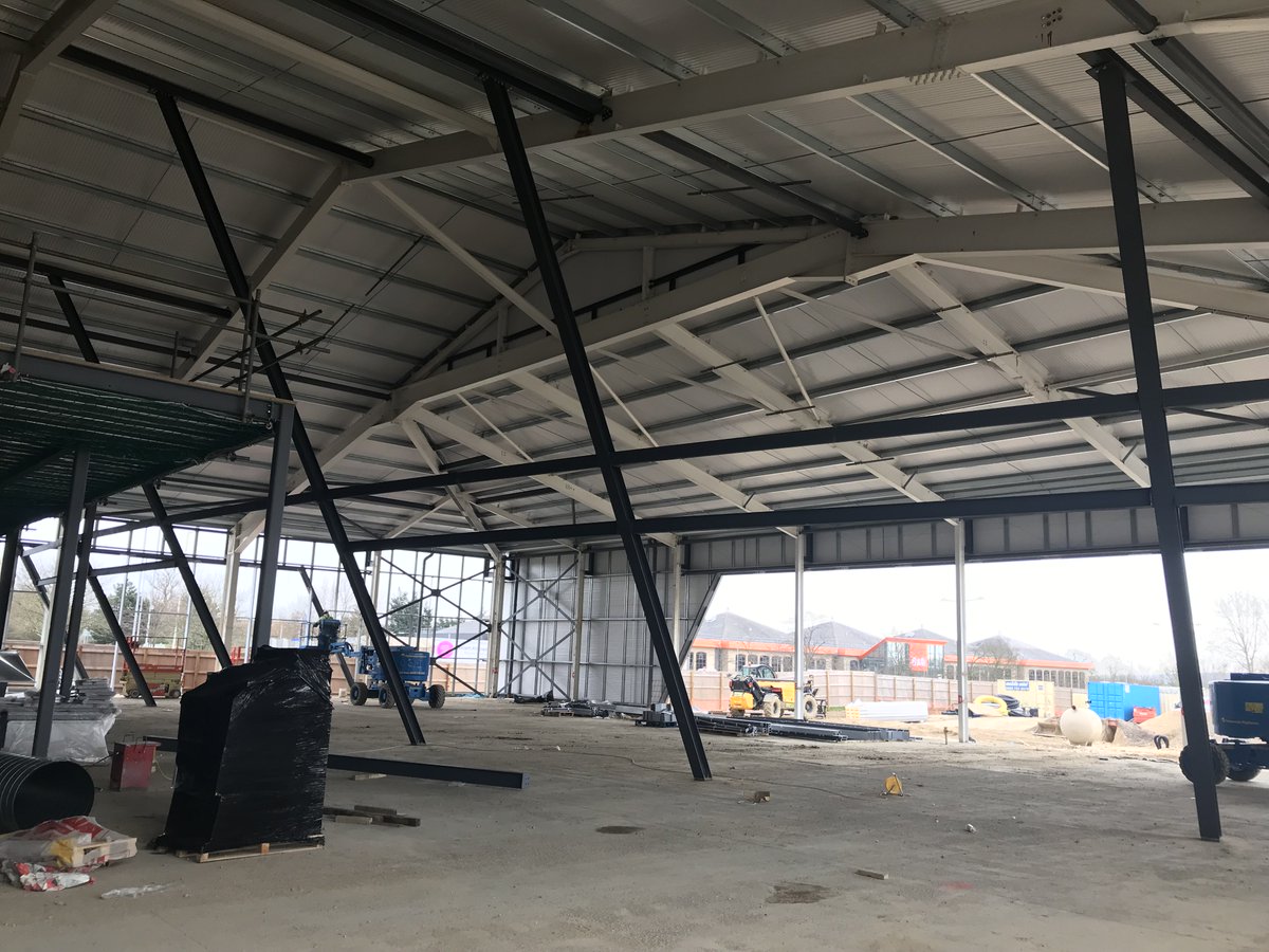 Works starting to take shape at Audi Chelmsford showroom. Roof is on, Mezzanine in, and Curtain walling is starting to take shape with sloping steels in place. #audi #automotive #architecture #detailsindesign #chelmsford