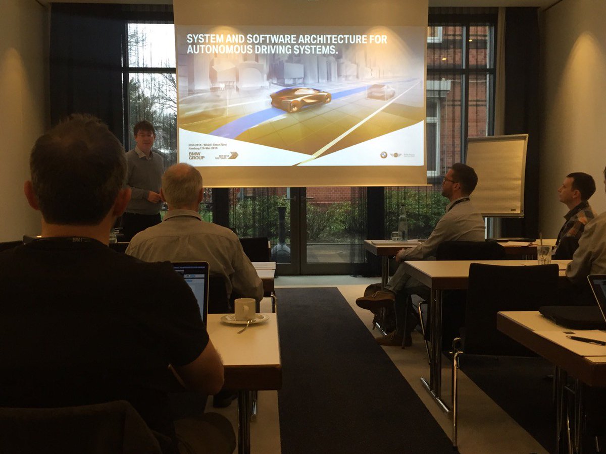 WASA_2020's tweet photo. Simon Fürst (BMW) giving a keynote on the System/Software Architecture for Autonomous Driving Systems at #WASA2019 #icsa2019. https://t.co/Z61h2yJ1tQ