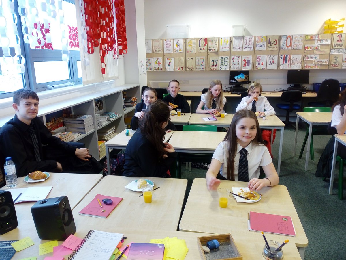 Mrs McKenzie's S1 French class enjoying a taste of French culture - miam, miam!