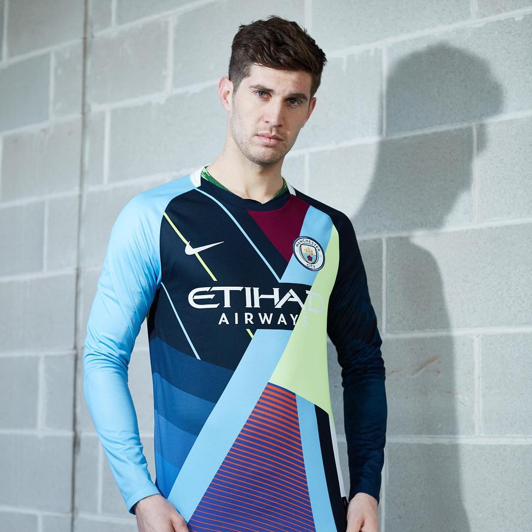 Man City have released this limited addition shirt which a mashup of their most memorable shirts from the past 6 years... My eyes hurt. (Via - @ManCity)