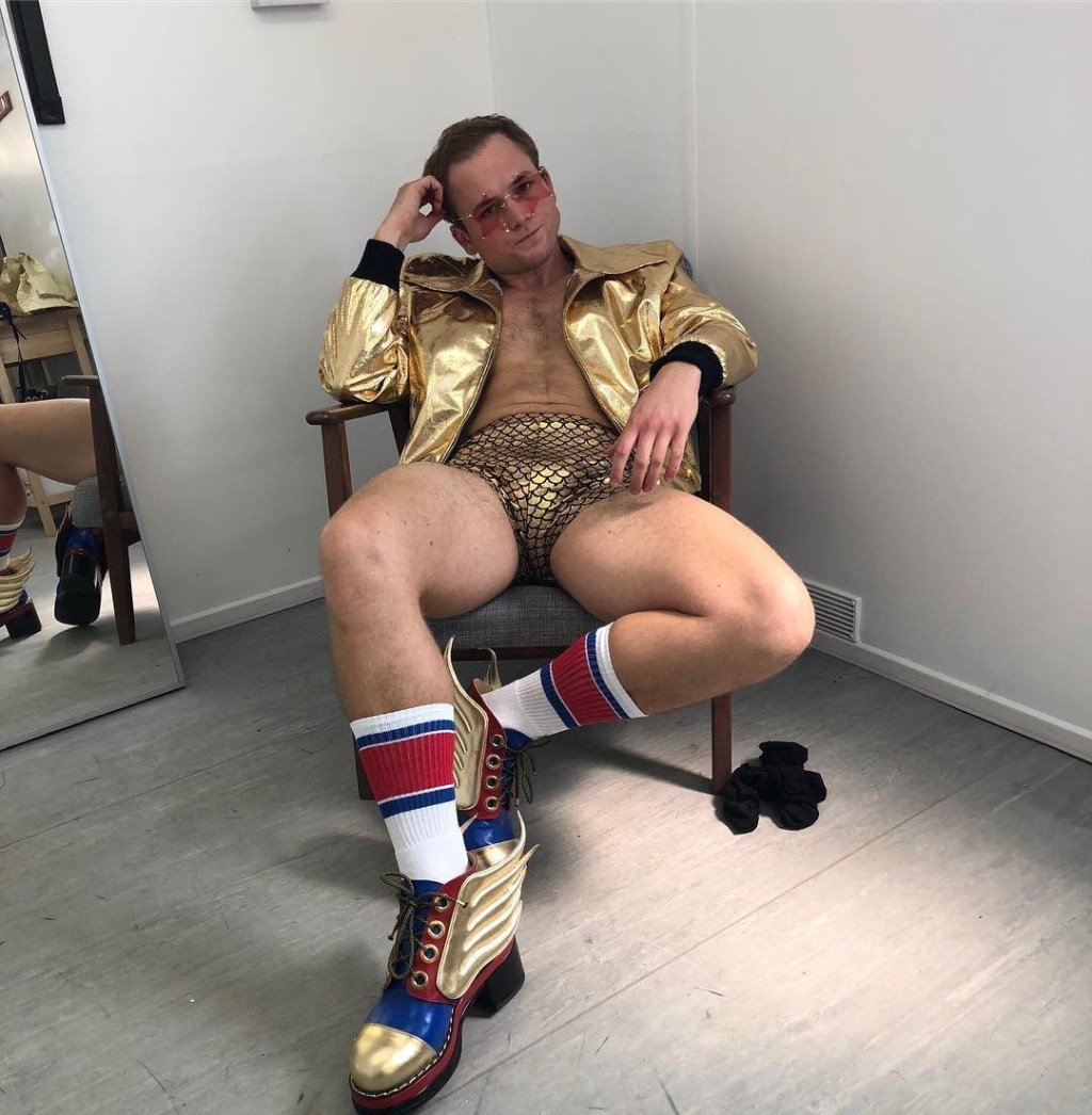 TODAY_NEWS_24's tweet photo. Taron Egerton wishes Elton John happy birthday in a tiny pair of gold hotpants – but fans are distracted by his bulge https://t.co/up1a3Dm9sW https://t.co/yGHJ6fKPm5