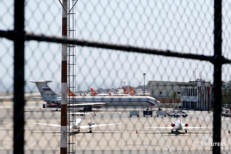 ReutersVzla's tweet photo. Russian air force planes land in #Venezuela carrying troops: report https://t.co/NlgYBNkl7w https://t.co/9cwSbzDOT1