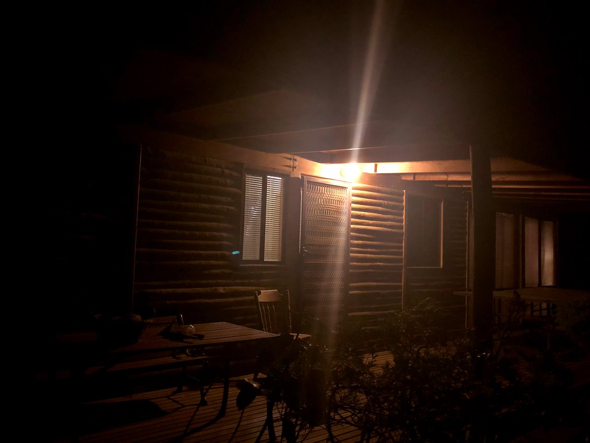 Now I’m kind of giggling to myself because of how creeped out I’m feeling, so I grab my phone to take a photo of the murder cabin I’m writing in for a few days. Here it is...