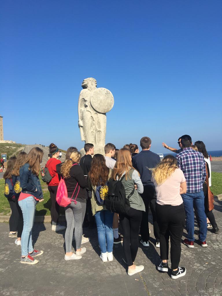 NCHS_WCL's tweet photo. NCHS students in A Coruña, Galicia listening to the story of Hércules. https://t.co/bEafIMX3Kw