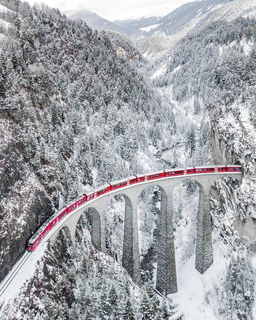 The red train, Landwasserviadukt, Switzerland.
Drone photo by Sebastianmzh