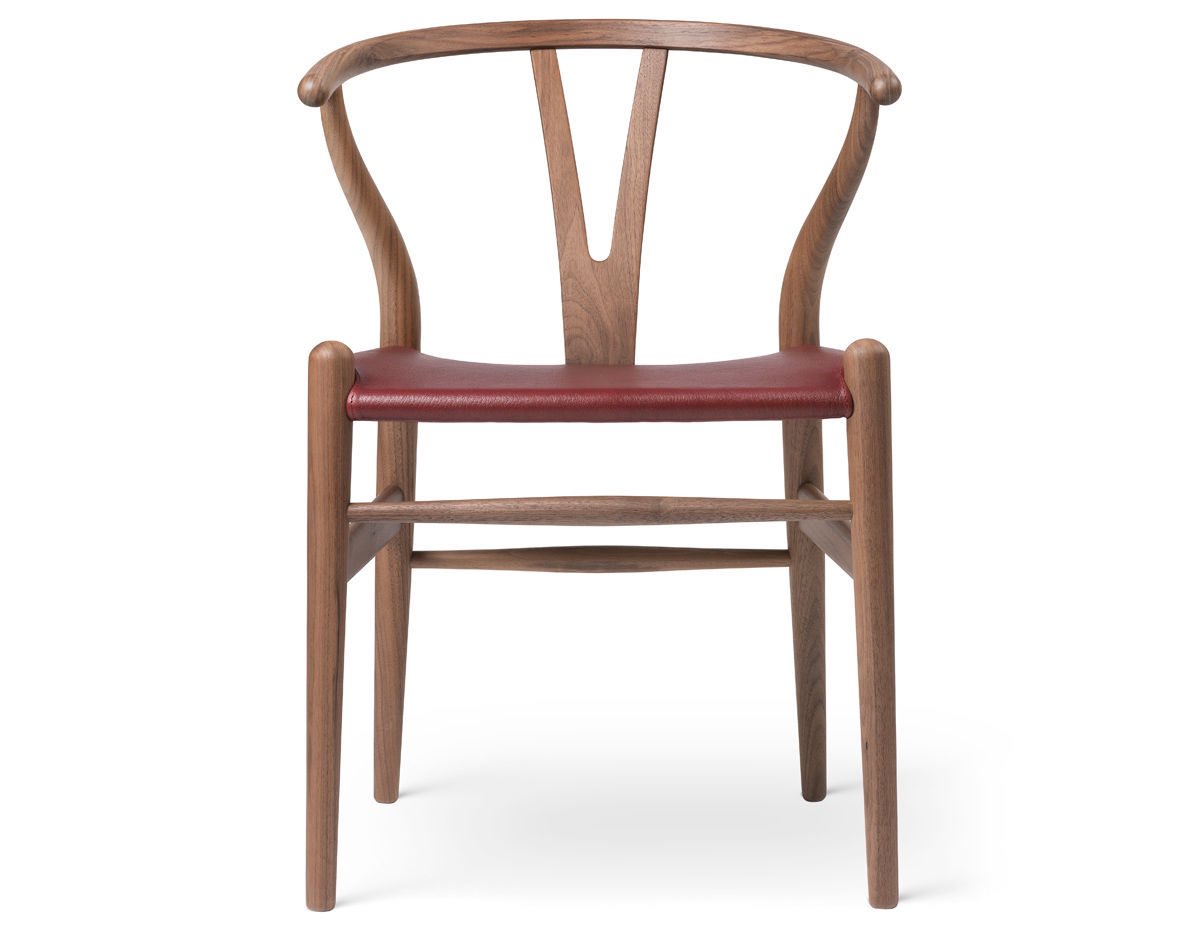hivemodern's tweet photo. In honor of Hans J. Wegner's 105th birthday on April 2nd, Carl Hansen &amp; son is presenting a previously unseen variant of the Master of Chairs' legendary Wishbone Chair. The unique special edition chair features a walnut frame which has been seamlessly combined leather in red hue. https://t.co/k9GsyceBja