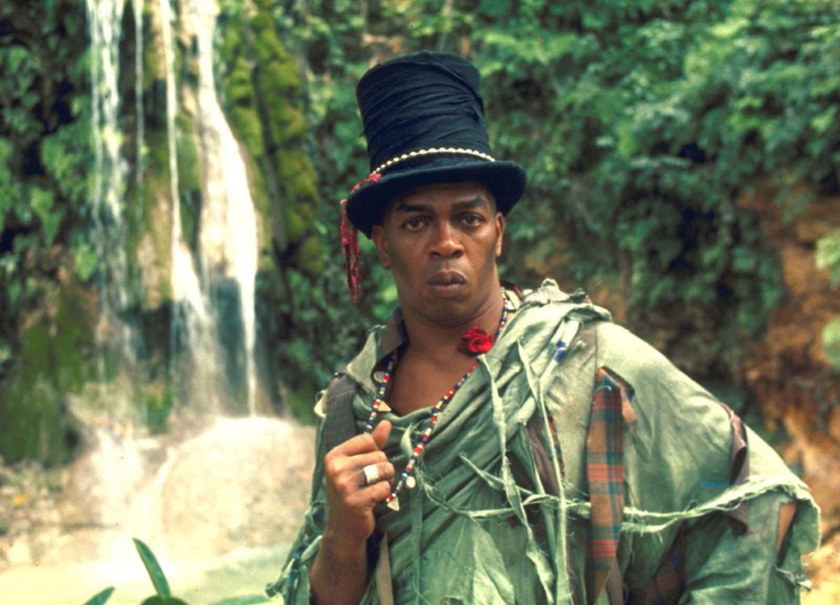 A production still of Geoffrey Holder as Baron Samedi on location just off the main Montego Bay to Falmouth Road in Jamaica during filming for Live And Let Die (1973) #Bond #JamesBond #Jamaica 

Discover the archive at > thunderballs.org
