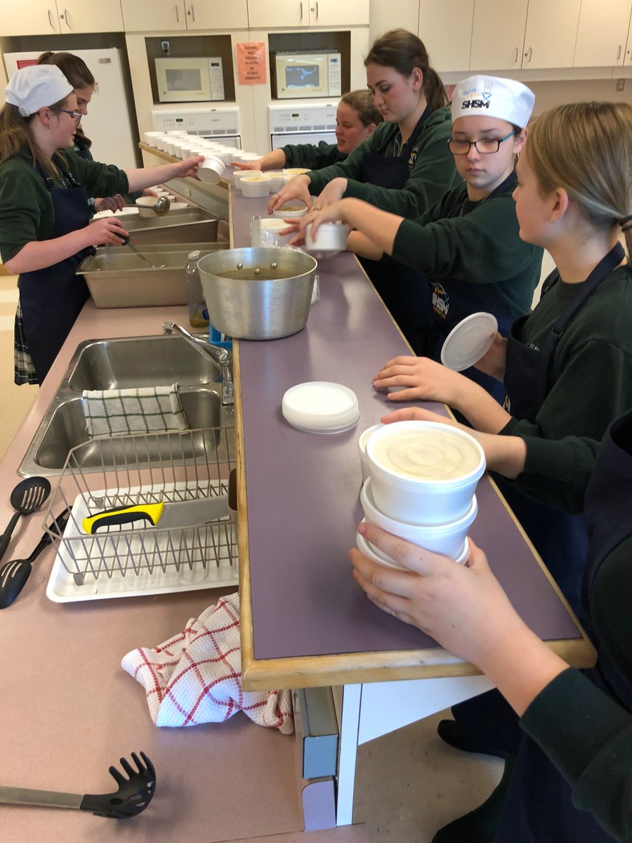 StBenedictSud's tweet photo. A win-win situation.  Hospitality and Tourism SHSM students need real life experience whipping up and catering an event.  The Holy Cross students reap the rewards.  That equals a completely successful Cub Café Pasta Day!  @PublicHealthSD and #NFVP https://t.co/YAi7hljEst