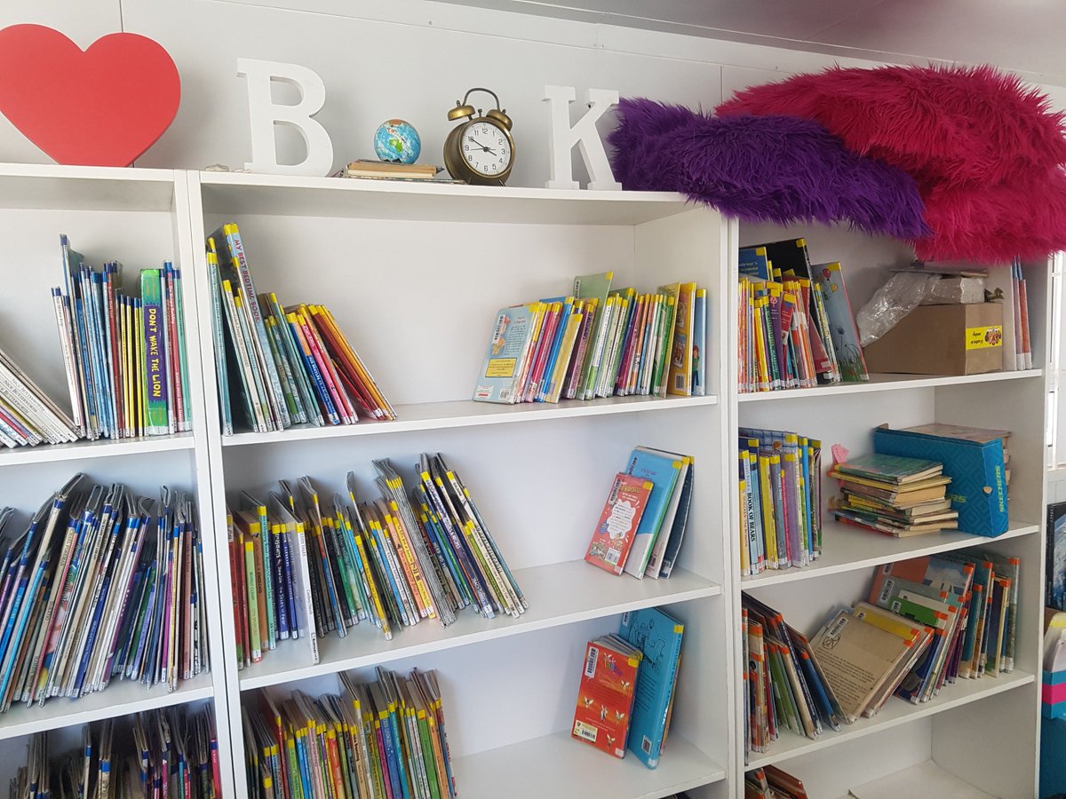 BreadlineAfrica's tweet photo. The kids of Silverlea Primary School have integrated the Breadline Africa Library Container into their school day. The school has created library schedules to allow learners to have reading sessions. #BreadlineAfrica #EnablingFutures @help2read #ReadMonth https://t.co/ymmZgzngdD