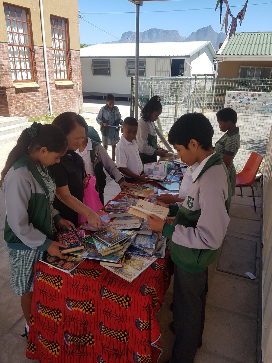 BreadlineAfrica's tweet photo. The kids of Silverlea Primary School have integrated the Breadline Africa Library Container into their school day. The school has created library schedules to allow learners to have reading sessions. #BreadlineAfrica #EnablingFutures @help2read #ReadMonth https://t.co/ymmZgzngdD