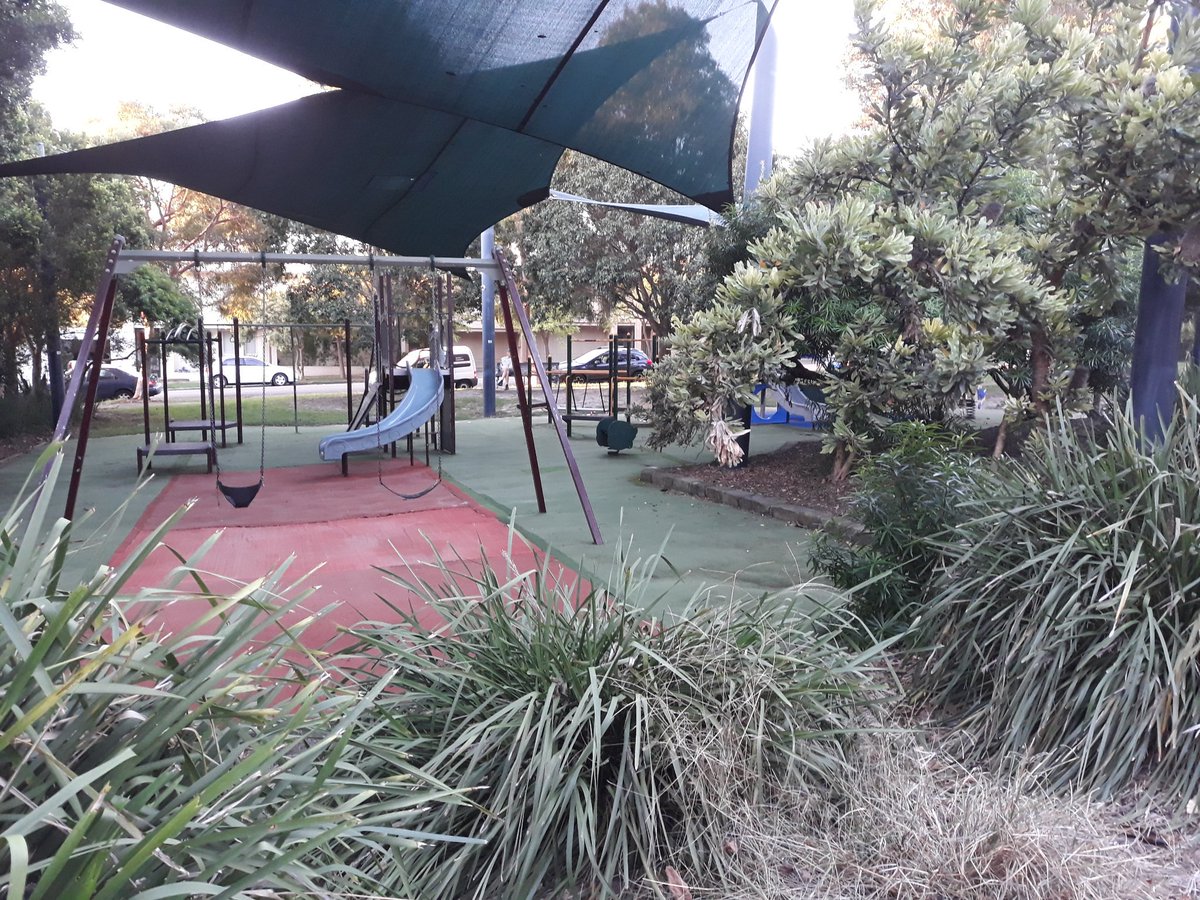 nessiejones22's tweet photo. Quiet little children's playground. Central Sydney. So bushy, leafy. Such generous play equipment for a tiny park compared to #cbr. Nice to see. #bushycity #gooddesign #oldzone https://t.co/L2qNdJZ68c