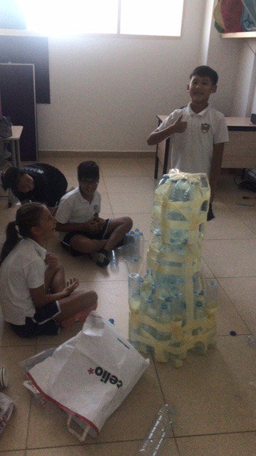 RISDXB_SCIENCE's tweet photo. A work in progress since January. 5D using their art and science skills to create a rocket from recycled water bottles and newspapers. The next step now is to code and programme the rocket. #STEAM #science #coding #art https://t.co/NgQewzdYNu