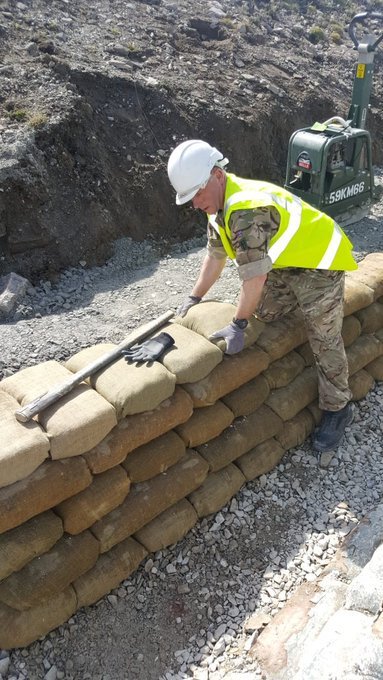 There is quite a bit of science and engineering behind sandbags but principles remain fairly simple, don't overfill, lay in a bond like bricks, tamp down, tie in and slope back. As shown by Sgt K a reserve soldier from ⁦170 Works Group here, an artist beyond compare/15
