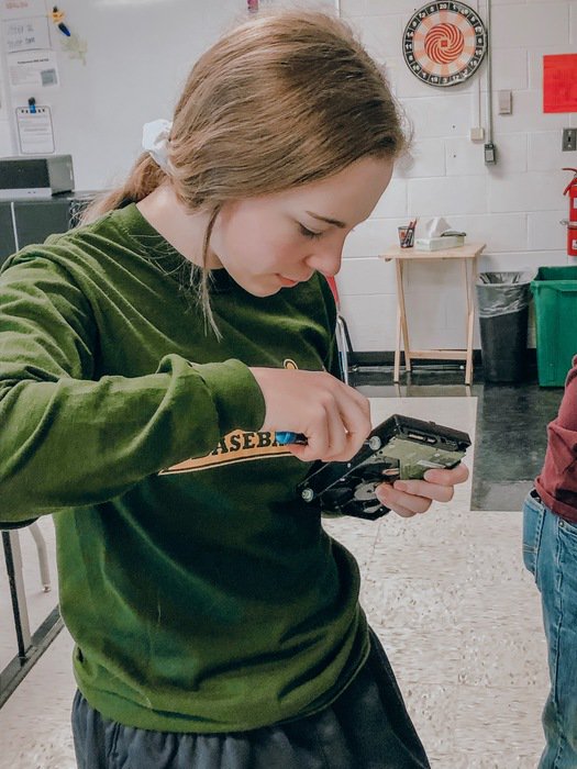 bdweedman's tweet photo. Students are working on unpacking the districts new computers!! Then they showed off their IT skills, by removing old hard drives and adding them into the new computers. Hands on learning at its finest! #atownproud https://t.co/W9axXNTdB7