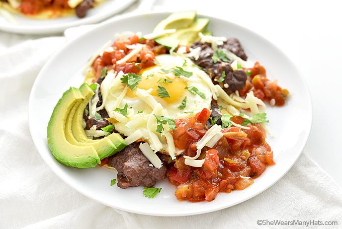 This quick and easy Huevos Rancheros recipe makes a colorful festive plate of good eats for any meal of the day. bit.ly/2sAqywf