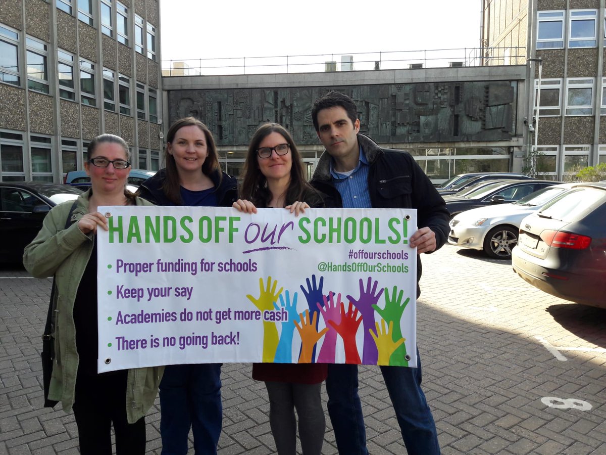 Campaigners asking questions at council meeting in Lewes today.