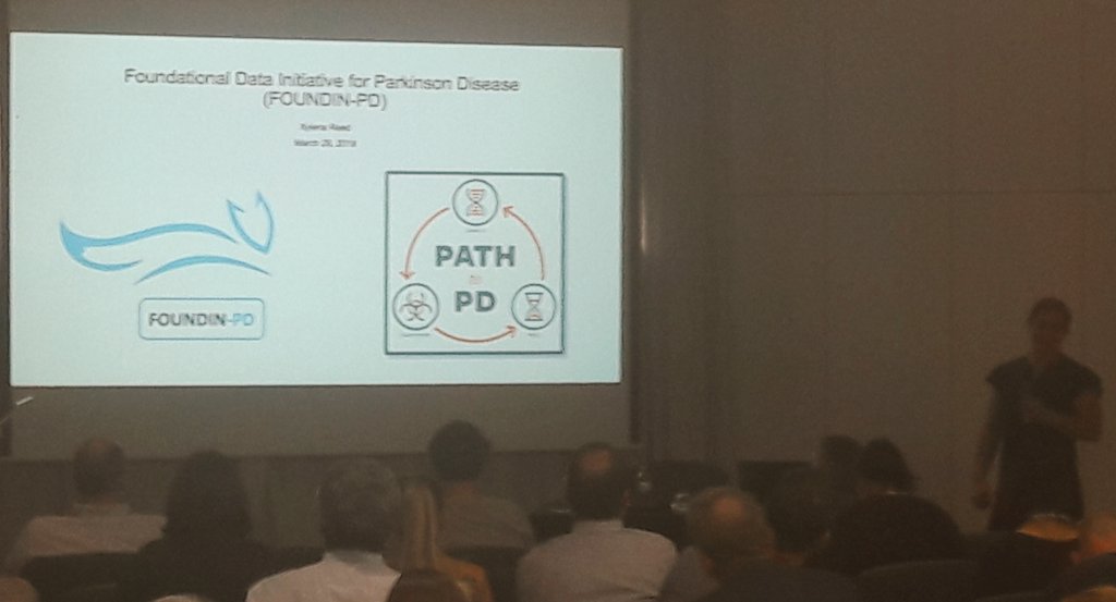ScienceofPD's tweet photo. Xylene Reed @NIH is kicking things off after lunch at the @pdgenetics
meeting by describing the FOUNDIN PD study, which is being supported by the @MichaelJFoxOrg. This project will generate a public atlas of iPS cells with PD genetic risk factors https://t.co/s6HTMxWlNO