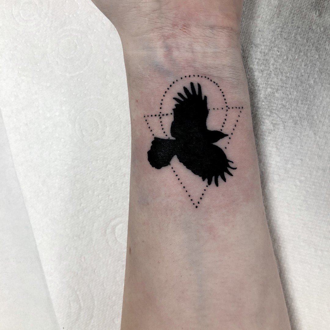 Silhouette Flying Crows Tattoo On Wrist By Samantha