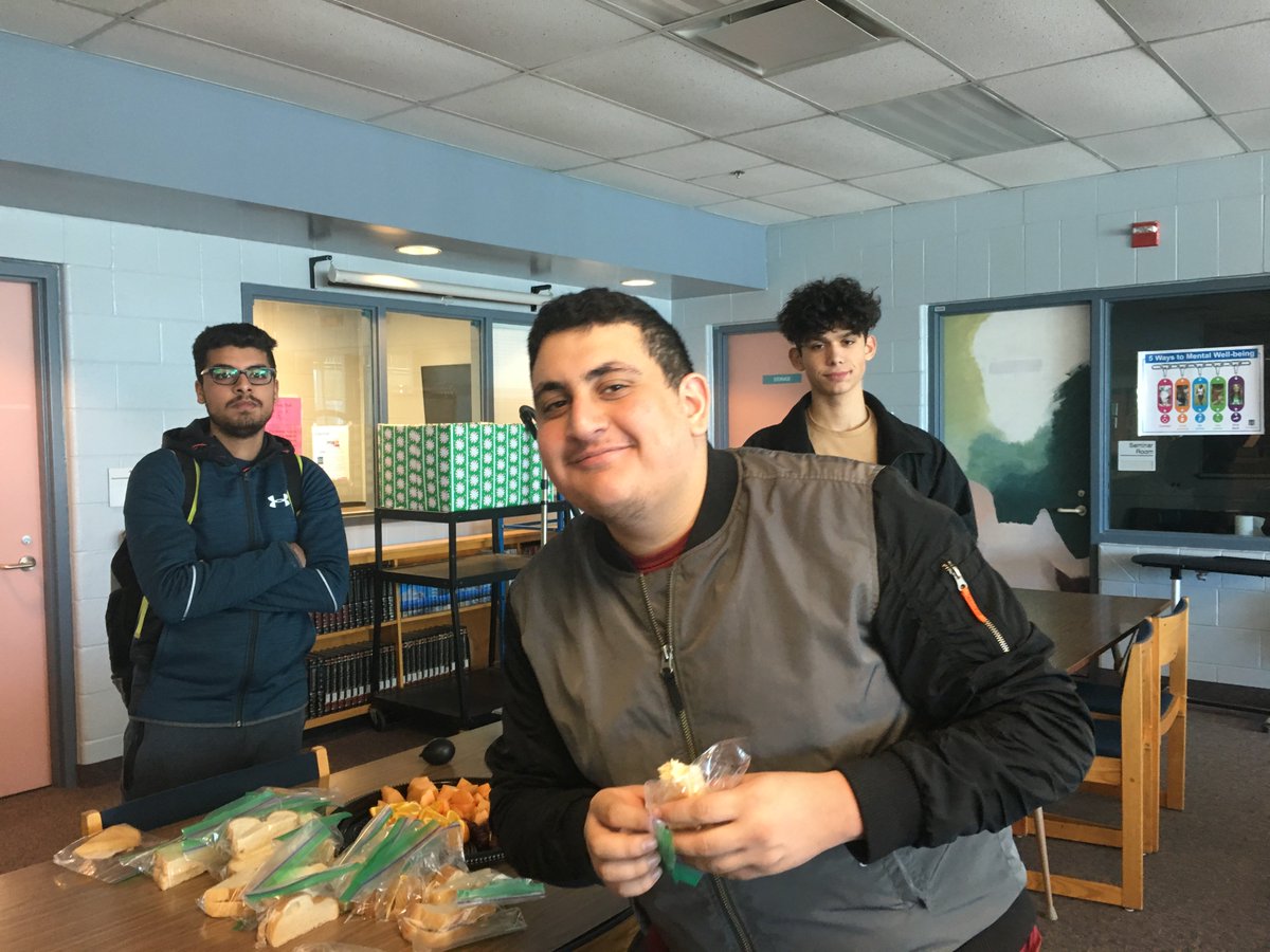 SaltfleetHSLib's tweet photo. Wellness Week day 2 activity at Saltfleet ! Students enjoying a light lunch, good company and fun activity (making a stress ball) in the LLC. https://t.co/vQjUi9ifgw