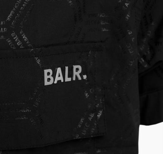 Balr2J's tweet photo. 【入荷情報】#BALR - 日本未発売、 LIFE OF BALRシリーズのヘキサゴンショートスリーブシャツが入荷です♪
サッカーボールをイメージしたヘキサゴンはシンプルながらヘビ柄のよう男らしさ・色気を醸し出しています。胸元のBALRのロゴプレートもラグジュアリーです♪ >> https://t.co/hKjKyOSqH6 https://t.co/JTvI9OzLY9