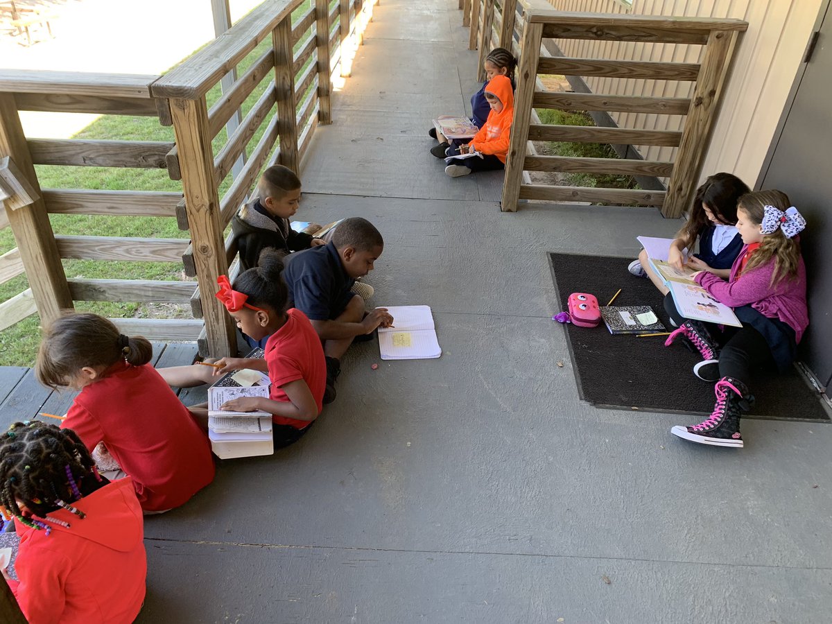SuperN2nd's tweet photo. My students are DETERMINED to continue their partner work on learning about the authors use of playful words in the text. We had a small issue with our classroom so we took our learning outside. #flexibilty #determined #nitschscholars https://t.co/ijgkKR1e4y