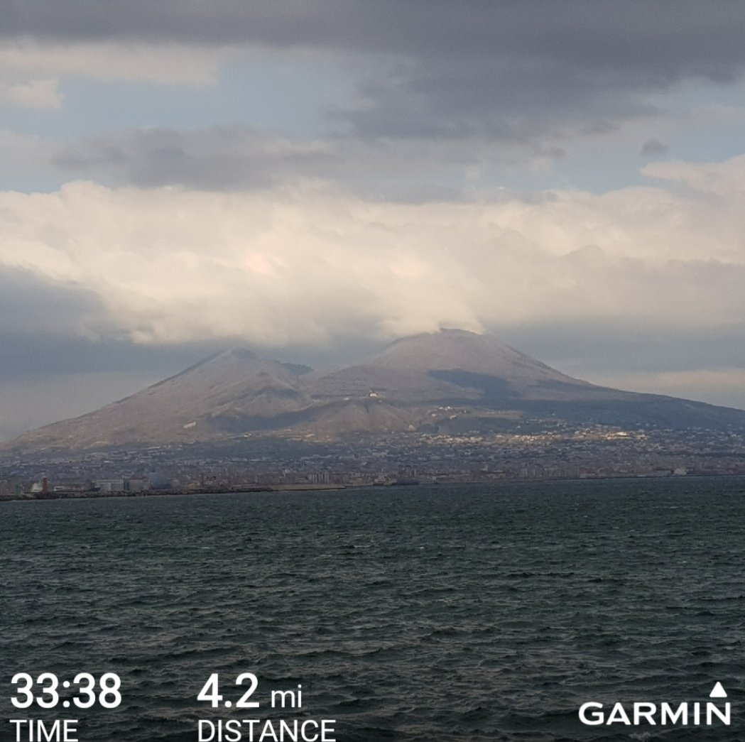 runners_blue's tweet photo. Afternoon run overlooking Mount Vesuvius. Hoping for the cloud cover to clear for the morning and a better shot. #ukrunchat #running #workrun #Team999 https://t.co/166Ic65AyM