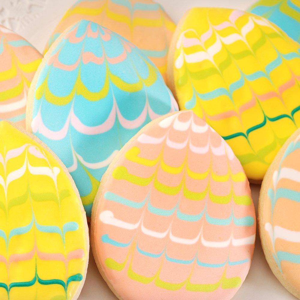 PoppiesDough's tweet photo. Spring means so many beautiful colors. Our decorators went all out this year with our Easter Egg designs 🥚
.
.
.
#easter #eastereggs #cookies #cookie #eastercookie #sugarcookie #shortbread #handdecorated #artisan #artisanbakedgoods #chicagobakery #yummy #easterbasket #delicious https://t.co/ln9VX7GvVD