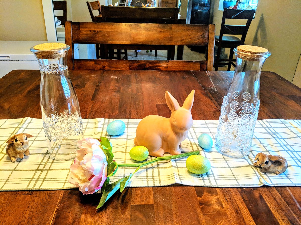 thecouchsleuth's tweet image. #springtablescape is in full effect. I'm kind of stumped on what to put in the glass jars. Grass? Mini eggs? Candy? I also wish I had another one of those peony flowers. What would you change if you were me? 
 
#Spring2019 #centerpieces #easter #decor #bunnies #glassjar