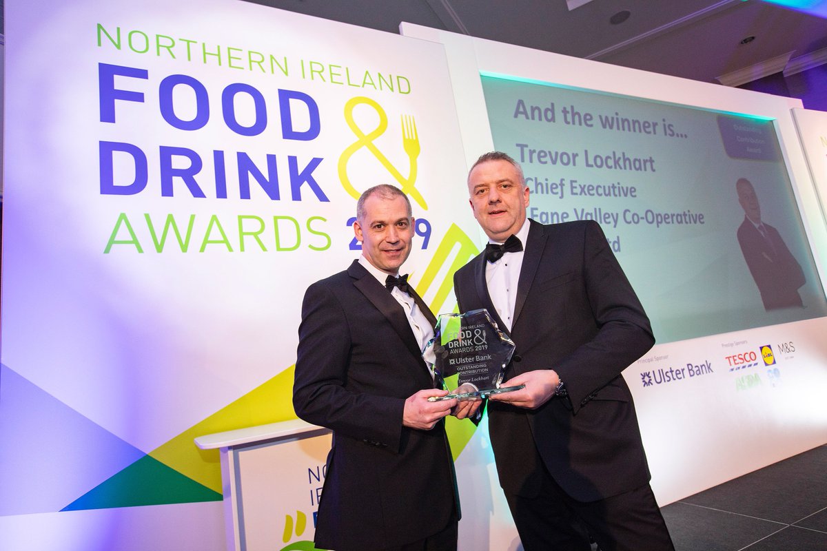 FaneValley's tweet photo. Nigel Walsh, Director, Corporate and Commercial Banking at Ulster Bank presents Trevor Lockhart, Group Chief Executive of Fane Valley with the 'Outstanding Contribution' to the Industry Award. #NIFDA @NIfoodanddrink #ULSTERBANK #AGRIFOODS #fanevalley https://t.co/yaNmaVoWzi